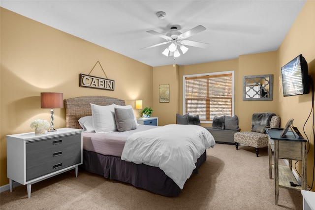 bedroom with light colored carpet and ceiling fan