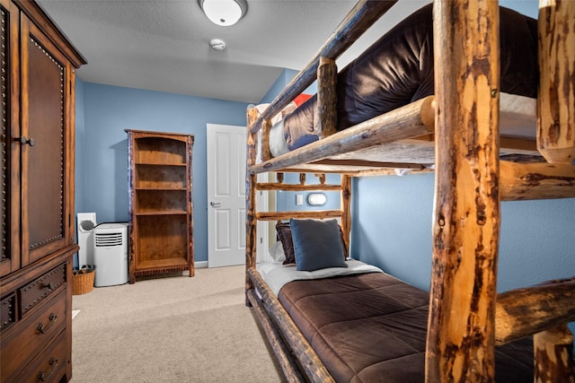 bedroom with light colored carpet