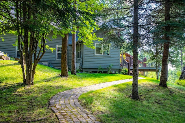 view of yard featuring a deck