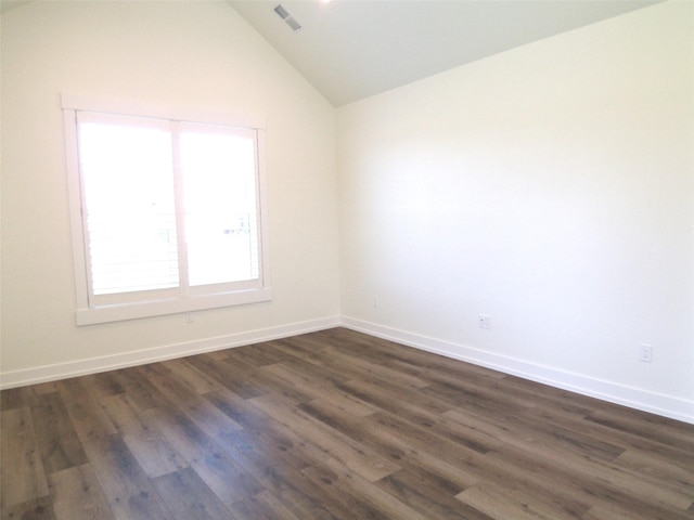 1228 Quail Ridge Dr, Kalispell, MT 59901 - spare room with lofted ceiling and dark wood-type flooring