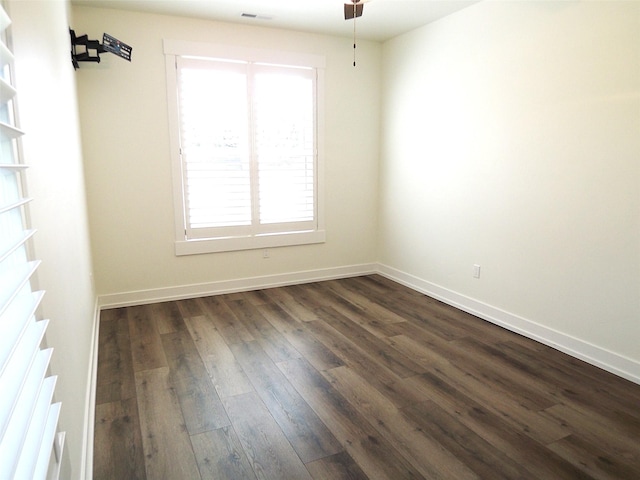 1228 Quail Ridge Dr, Kalispell, MT 59901 - unfurnished room featuring dark wood-type flooring and plenty of natural light