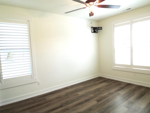 1228 Quail Ridge Dr, Kalispell, MT 59901 - empty room with a ceiling fan and dark wood-type flooring