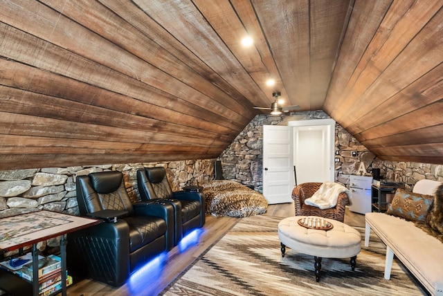 sitting room with lofted ceiling, wood ceiling, and wood finished floors