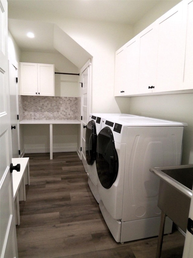 1228 Quail Ridge Dr, Kalispell, MT 59901 - laundry room featuring washing machine and dryer, cabinet space, dark wood-style flooring, and recessed lighting