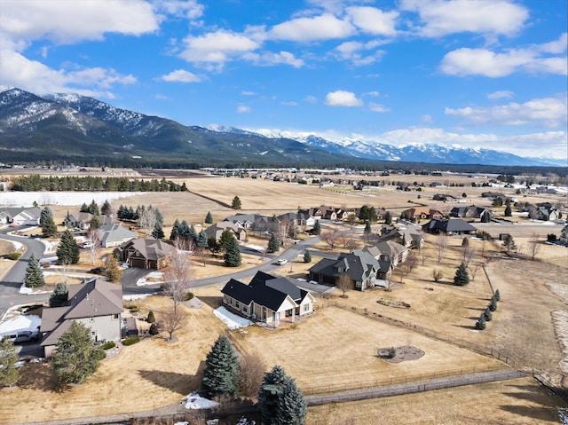 birds eye view of property with a residential view and a mountain view