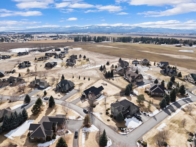 birds eye view of property featuring a residential view and a mountain view