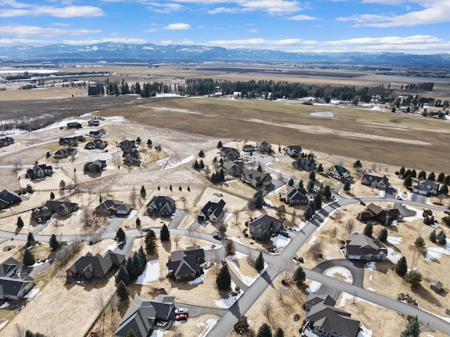 aerial view with a mountain view and a residential view