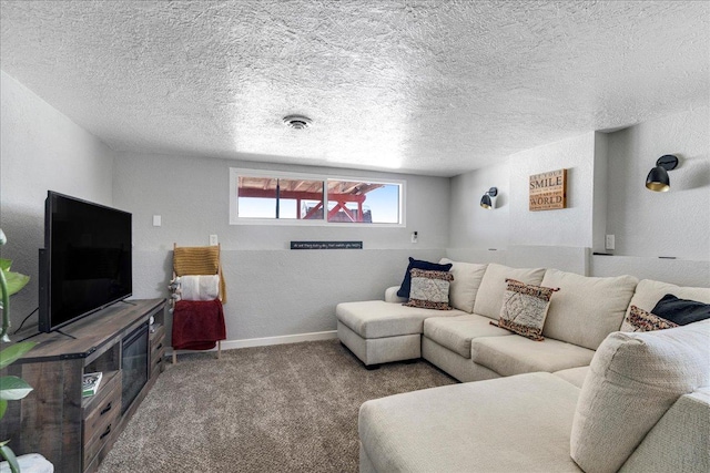 living room with visible vents, baseboards, a textured wall, a textured ceiling, and carpet flooring