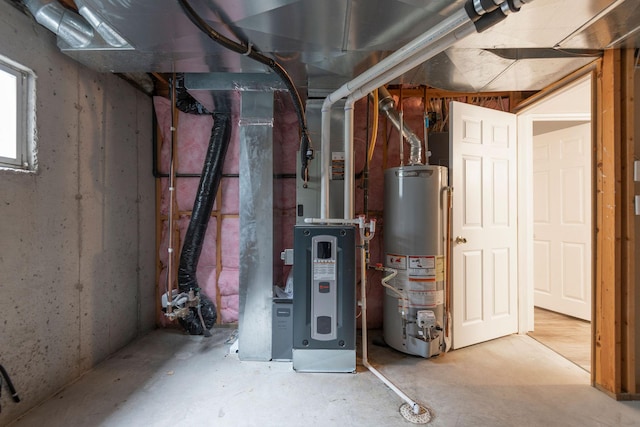 utility room with gas water heater