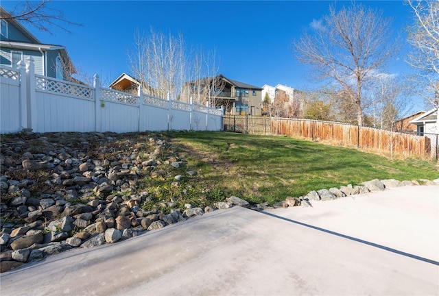 1949 University St, Helena, MT 59601 - fenced backyard with a patio