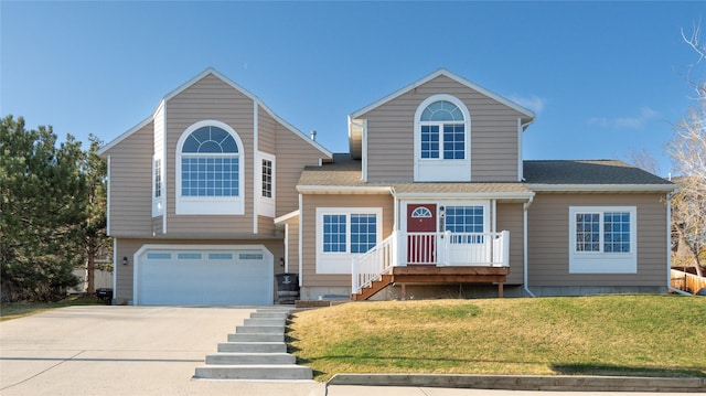 1949 University St, Helena, MT 59601 - view of front of home with a garage, driveway, and a front yard