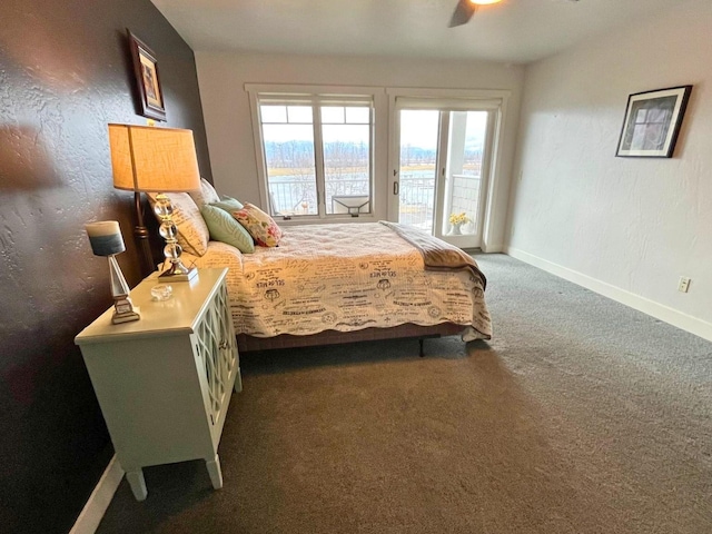 bedroom featuring baseboards, a textured wall, ceiling fan, access to exterior, and carpet flooring