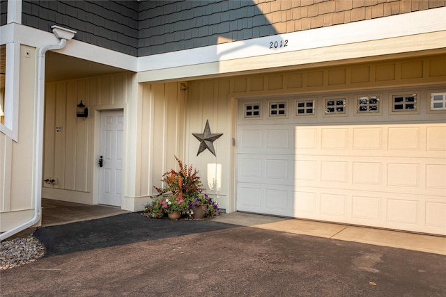 garage featuring driveway