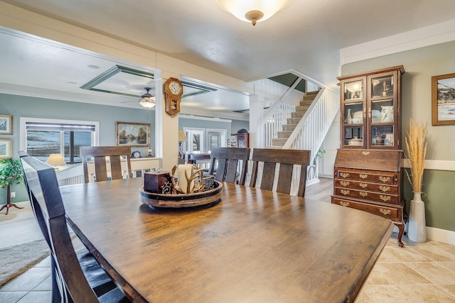 dining space featuring stairway, light tile patterned floors, baseboards, and ceiling fan