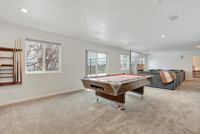 rec room featuring recessed lighting, carpet flooring, and a fireplace