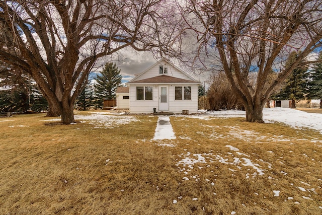 view of front of house with a lawn