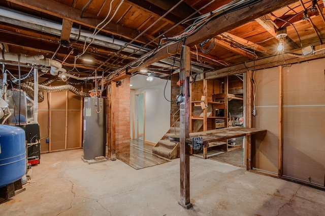 13195 US Highway 91 N, Conrad, MT 59425 - unfinished basement featuring water heater, stairway, and a water pressure tank