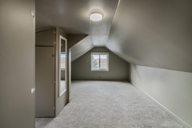 13195 US Highway 91 N, Conrad, MT 59425 - bonus room with light colored carpet, lofted ceiling, and baseboards