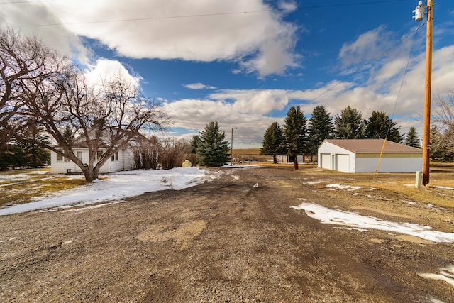 13195 US Highway 91 N, Conrad, MT 59425 - view of yard featuring an outdoor structure and a detached garage