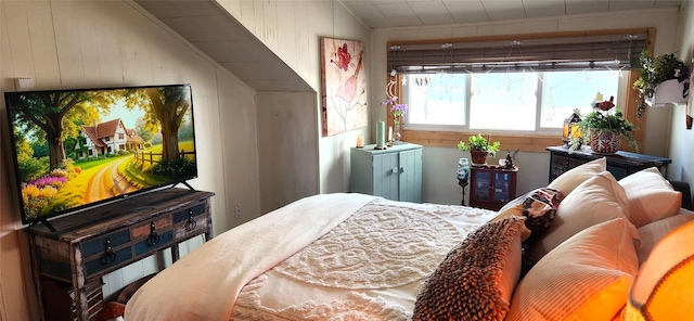 bedroom featuring vaulted ceiling