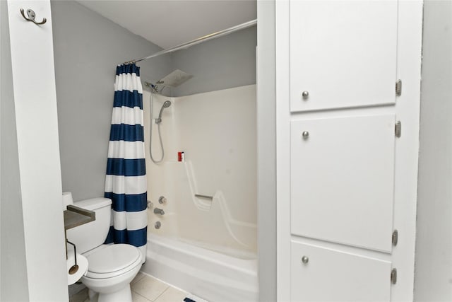 full bath with tile patterned flooring, shower / tub combo with curtain, and toilet