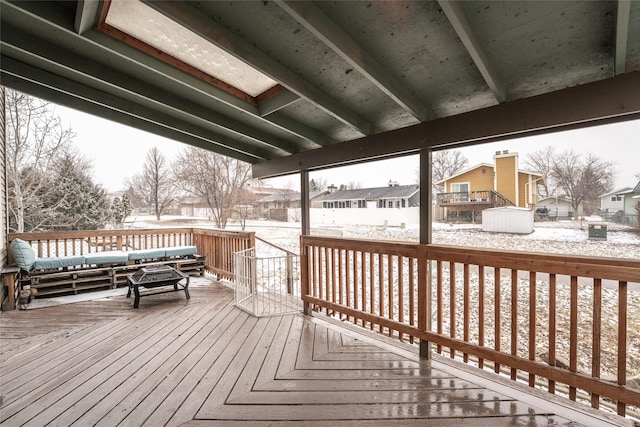 wooden deck with a residential view