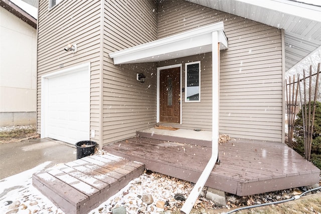 property entrance with a garage