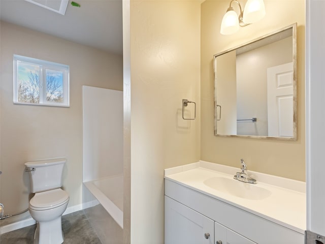 bathroom with visible vents, baseboards, vanity, and toilet