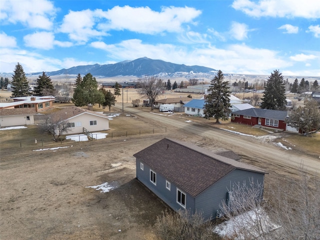 drone / aerial view featuring a residential view and a mountain view