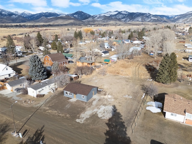 drone / aerial view with a residential view and a mountain view