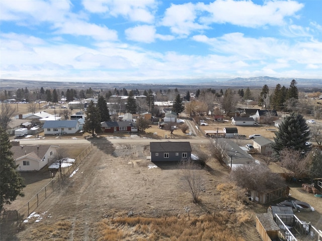 birds eye view of property with a residential view and a mountain view