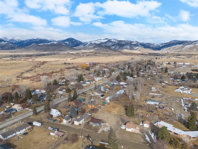 drone / aerial view with a residential view and a mountain view