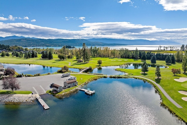 bird's eye view with a water and mountain view