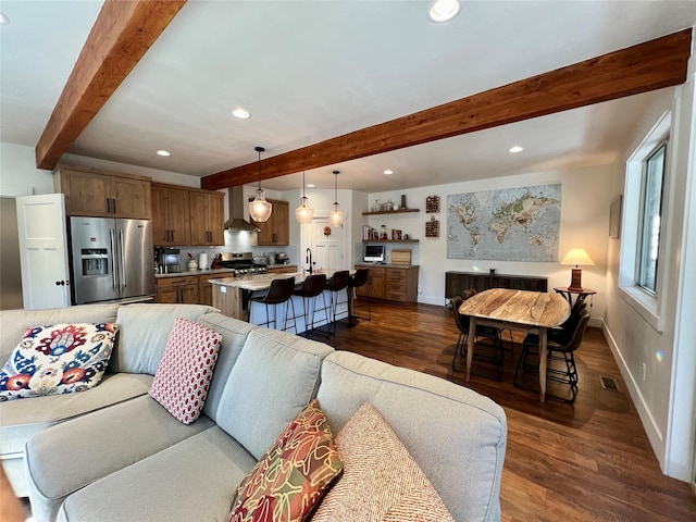 living area featuring dark wood-style floors, beamed ceiling, recessed lighting, and baseboards