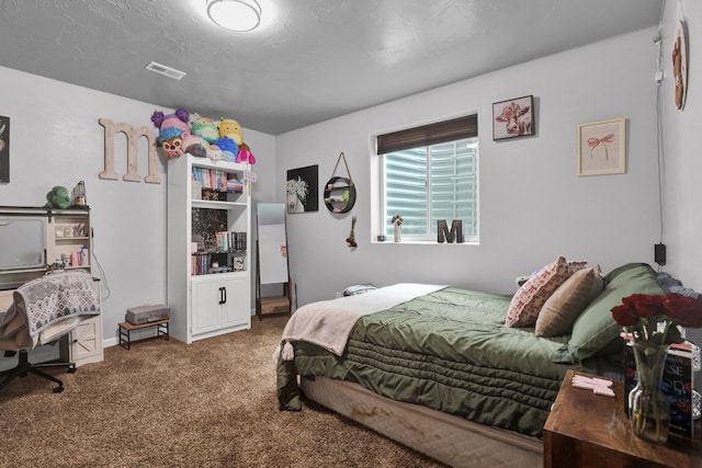 bedroom featuring carpet floors and visible vents