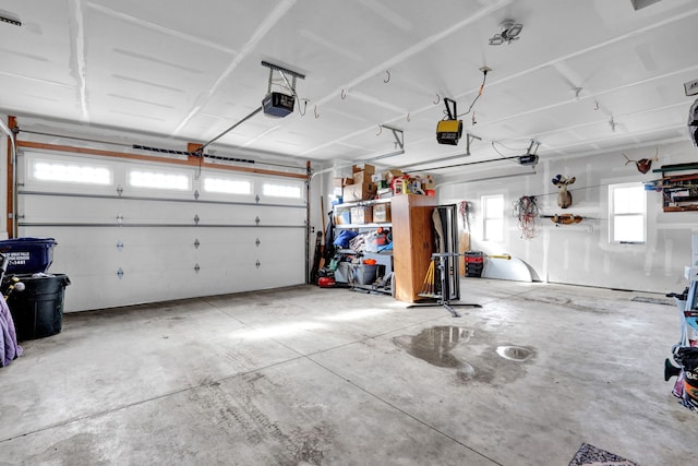 garage featuring a garage door opener