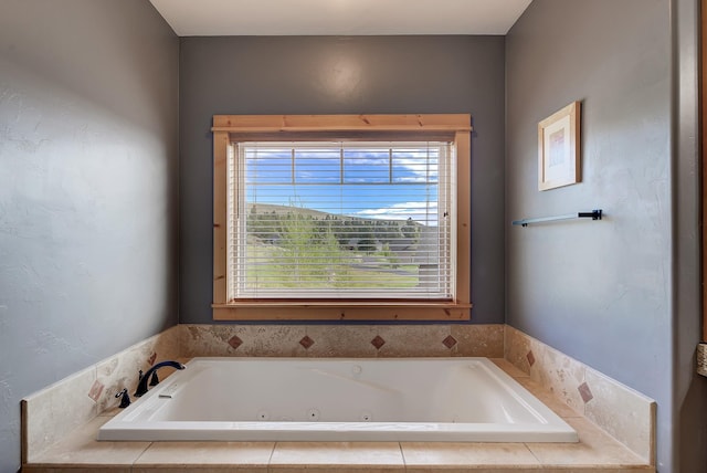 full bath featuring a whirlpool tub