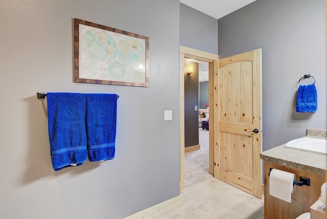 bathroom featuring a sink and tile patterned floors