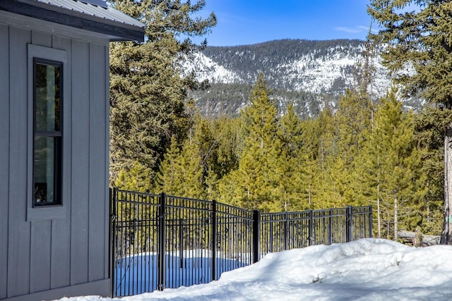 property view of mountains with a wooded view