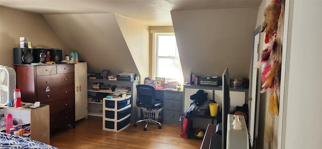 office featuring lofted ceiling and wood finished floors