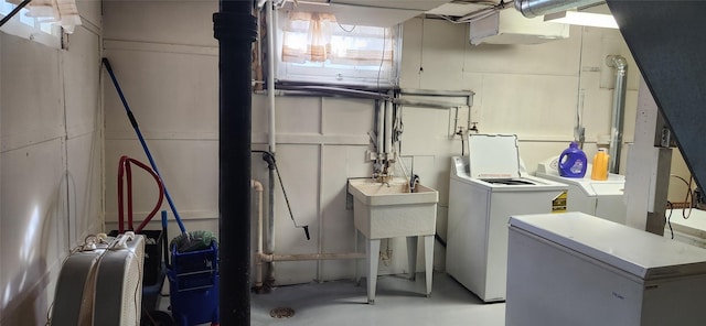 laundry area featuring laundry area and washer and clothes dryer