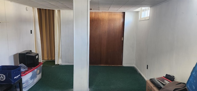 below grade area featuring carpet floors