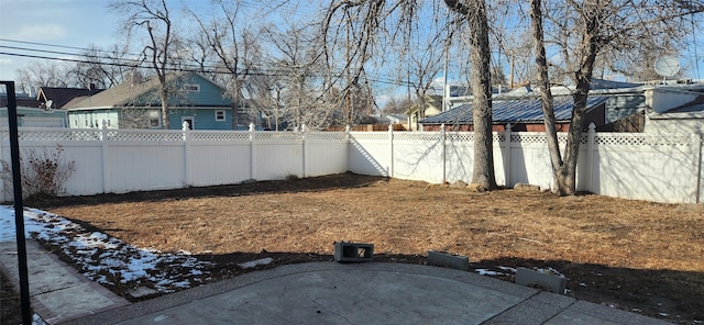 view of yard with a fenced backyard and a patio