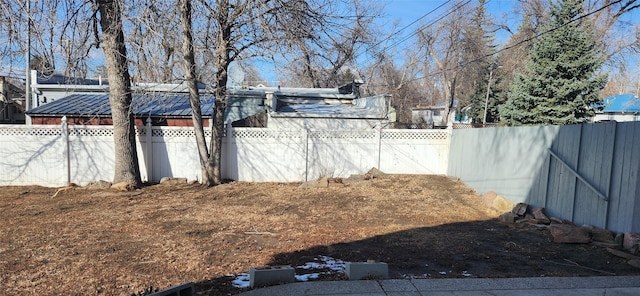 view of yard featuring a fenced backyard