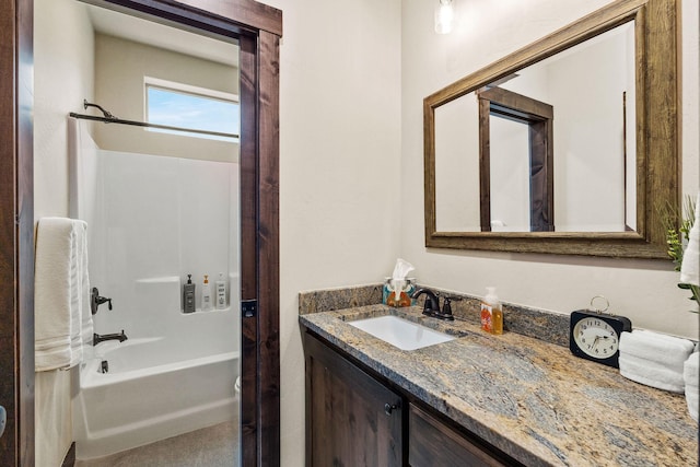 bathroom with shower / tub combination and vanity