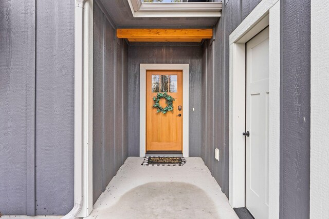 230 Forest Edge Trl, Kalispell, MT 59901 - craftsman-style house with aphalt driveway, board and batten siding, central air condition unit, and a front yard