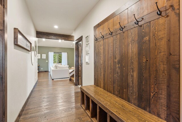 230 Forest Edge Trl, Kalispell, MT 59901 - living room with ceiling fan with notable chandelier, baseboards, vaulted ceiling, and dark wood-type flooring