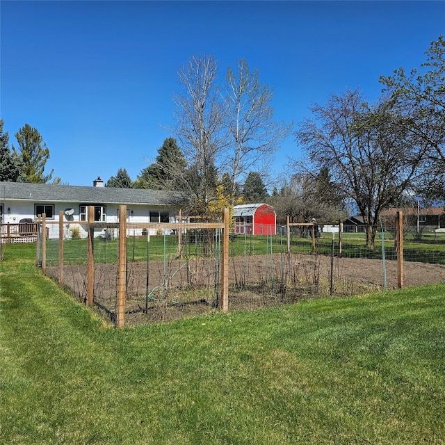 view of yard with fence