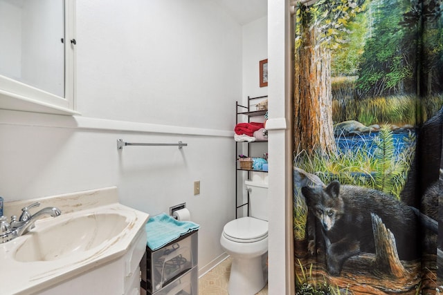 half bath with toilet and vanity