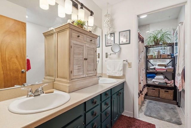 full bathroom featuring a sink and double vanity